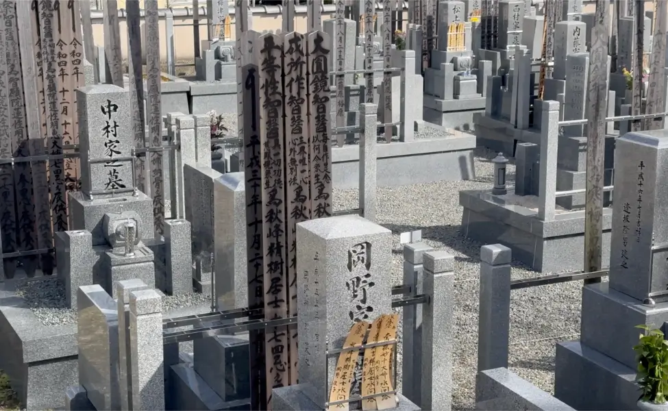 A Japanese cemetery with gravestones in Kyoto A Japanese cemetery with gravestones in Kyoto