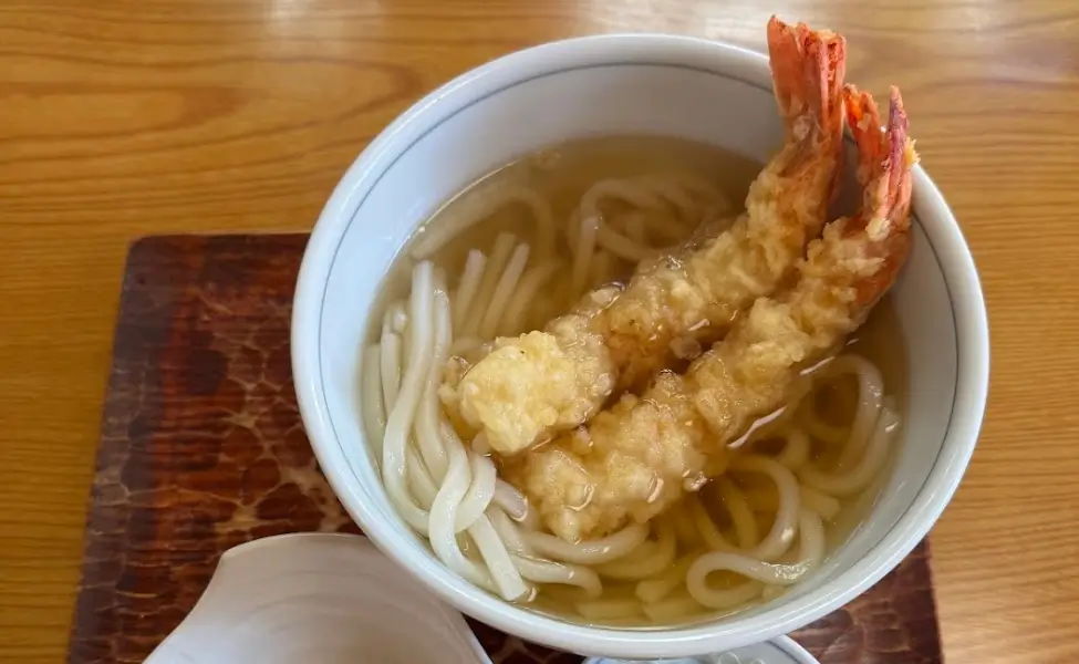 Udon A bowl of udon with 2 friend shrimp