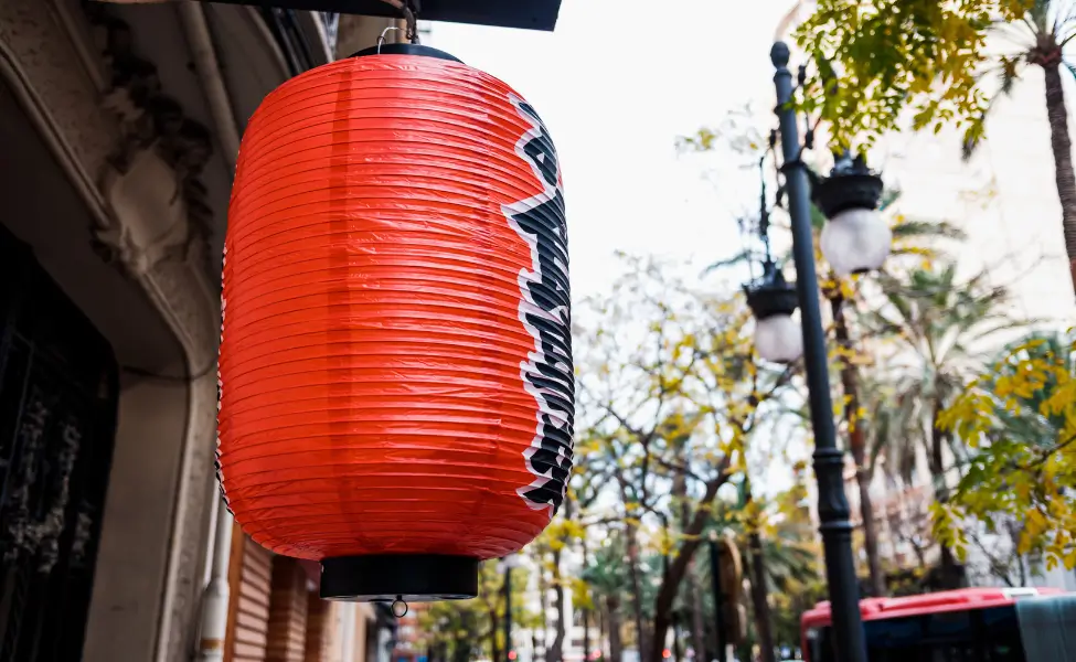 A red lantern outside a Japanese izakaya A red lantern outside a Japanese izakaya