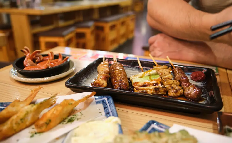 Eating at an izakaya Eating at an izakaya